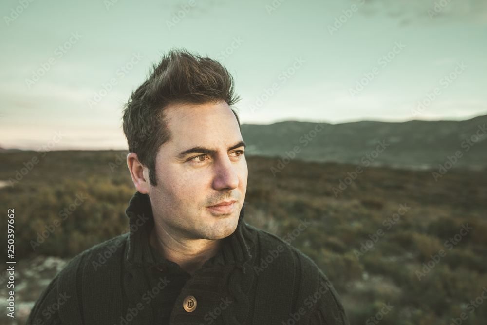 Portrait of a modern profile guy smiling outdoors. Photo style social networks and vintage Portrait of a modern profile guy smiling outdoors. Photo style social networks and vintage