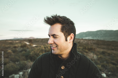 Portrait of a modern profile guy smiling outdoors. Photo style social networks and vintage