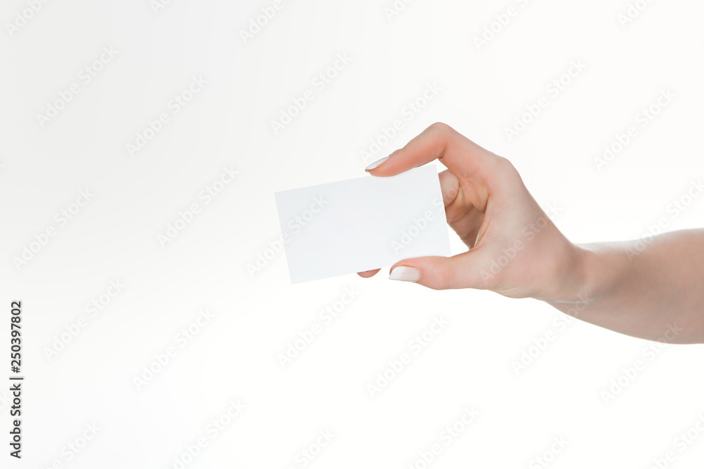cropped view of woman holding blank and empty card isolated on white cropped view of woman holding blank and empty card isolated on white