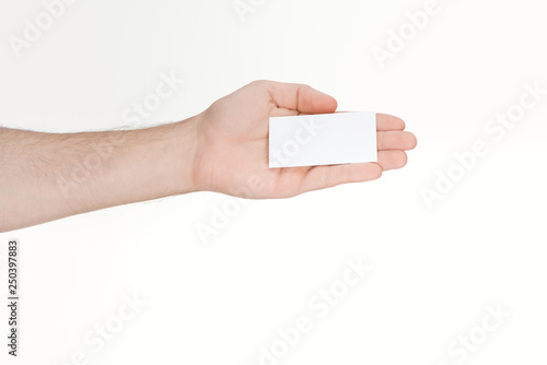 cropped view of man holding blank card on white background
