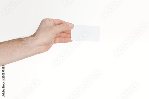 cropped view of man holding empty card on white background