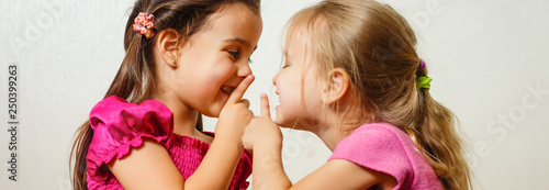 Φωτογραφία Two little girls sisters hugging