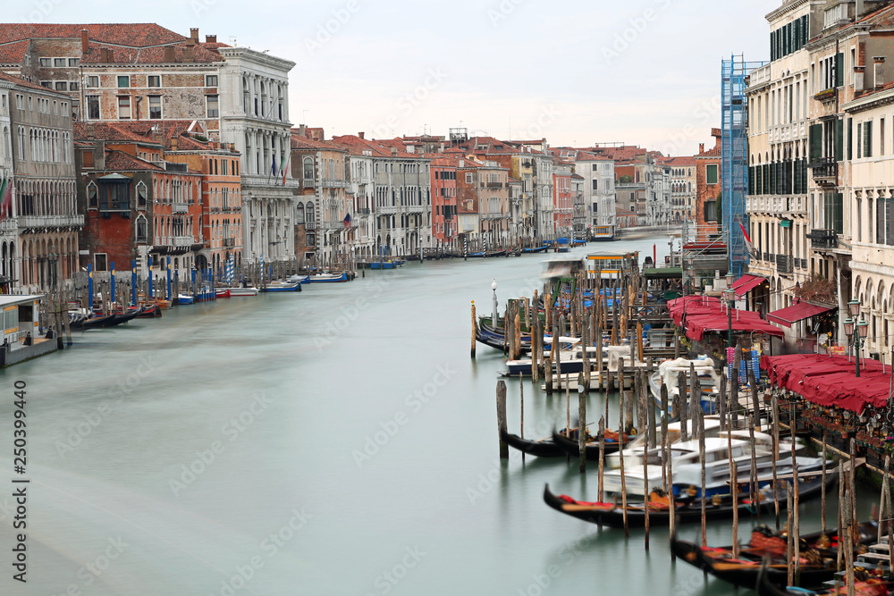 wide waterway called Canal Grande in Venice with long exposure