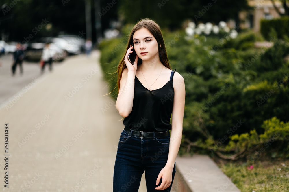young girl posing on a street in the city young girl posing on a street in the city