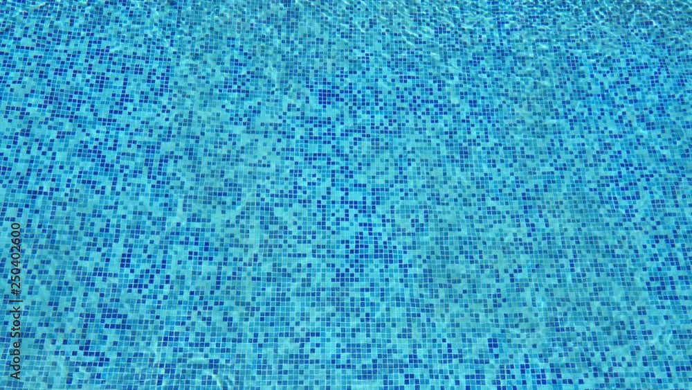 Blue ripped water in swimming pool. Abstract background Blue ripped water in swimming pool. Abstract background