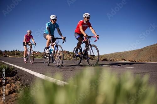 Group of road cyclists riding bikes