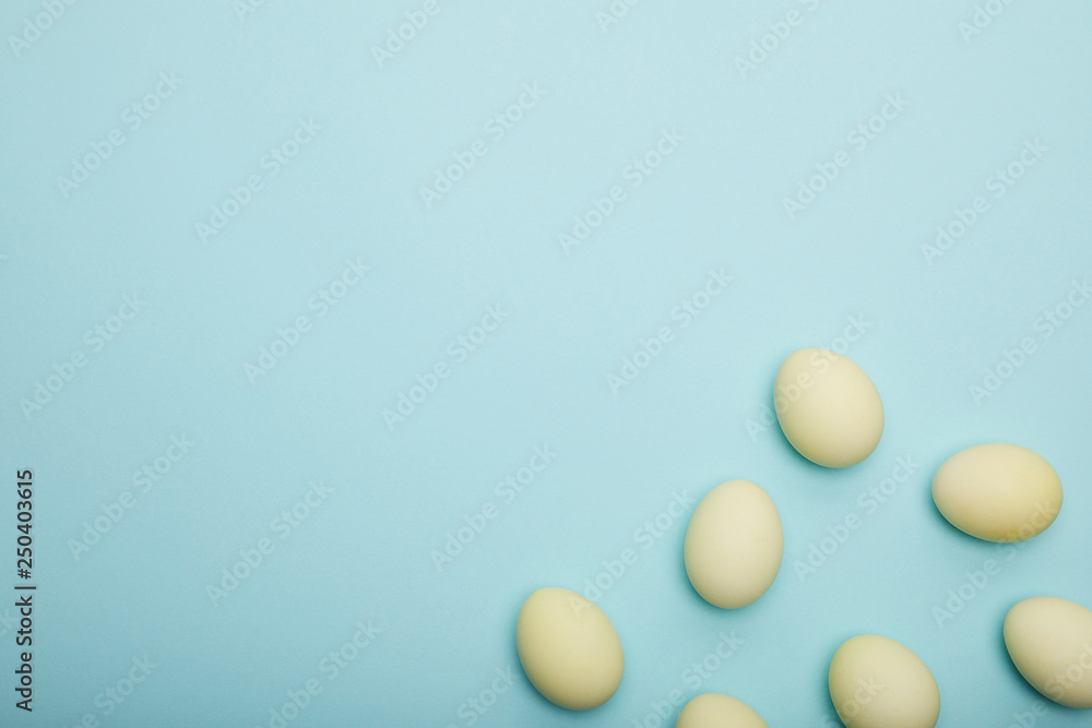 Top view of painted easter eggs on blue background Top view of painted easter eggs on blue background