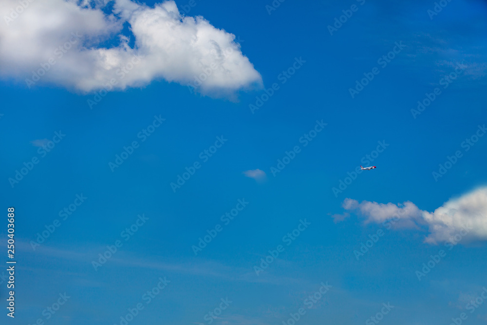 Blue sky with clouds. Beautiful calm sky with few clouds Blue sky with clouds. Beautiful calm sky with few clouds