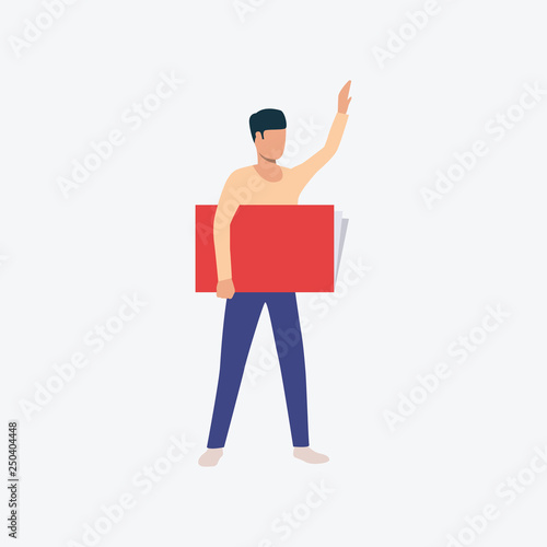 Man standing, holding big book and raising hand
