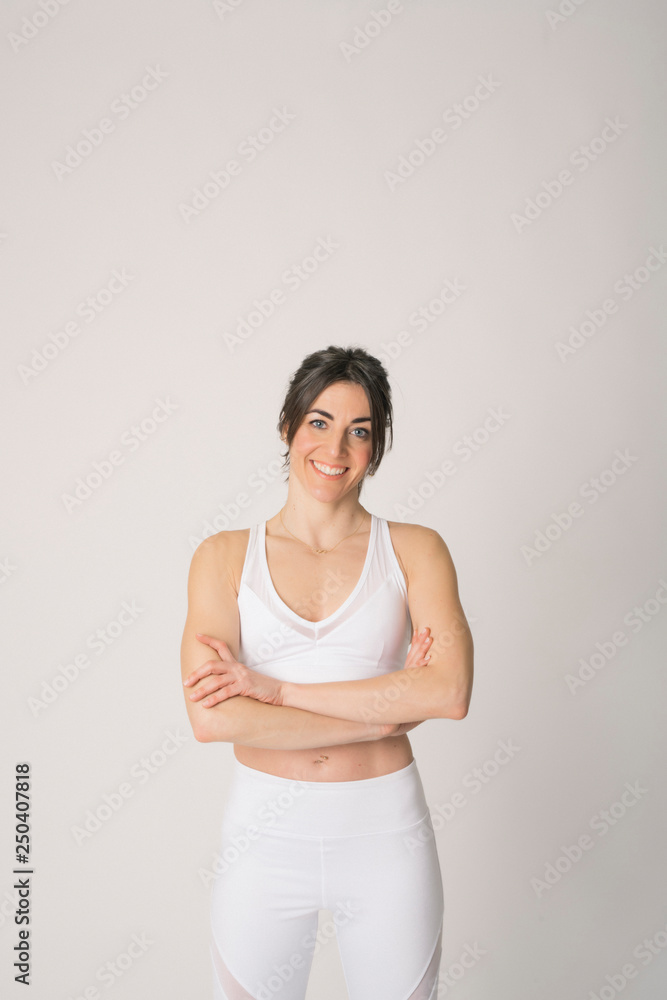 Girl with a sports outfit and white background Girl with a sports outfit and white background