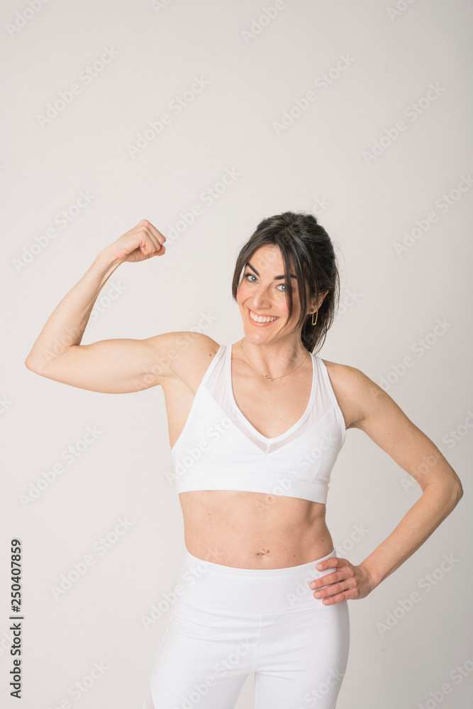 Girl with a sports outfit and white background Girl with a sports outfit and white background