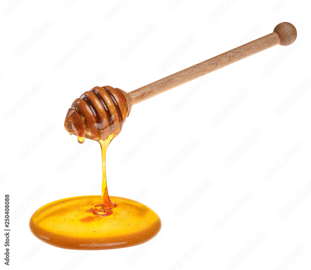 Honiglöffel mit einem Honigkleks Honiglöffel mit einem Honigkleks