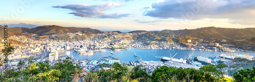 Fotografía Business concept, modern cityscape of nagasaki dusk from mount inasa, the new to