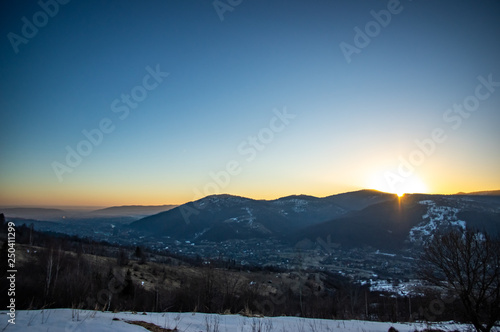 Dawn in the winter in the mountain town © onyx124