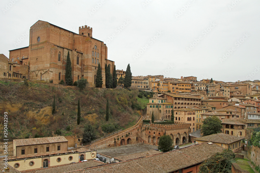 Basilica of San Domenico and cityscape of italian city Siena