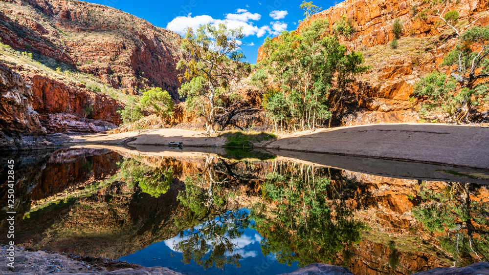 Scenic view of Ormiston gorge water hole in the West MacDonnell Ranges outback Australia