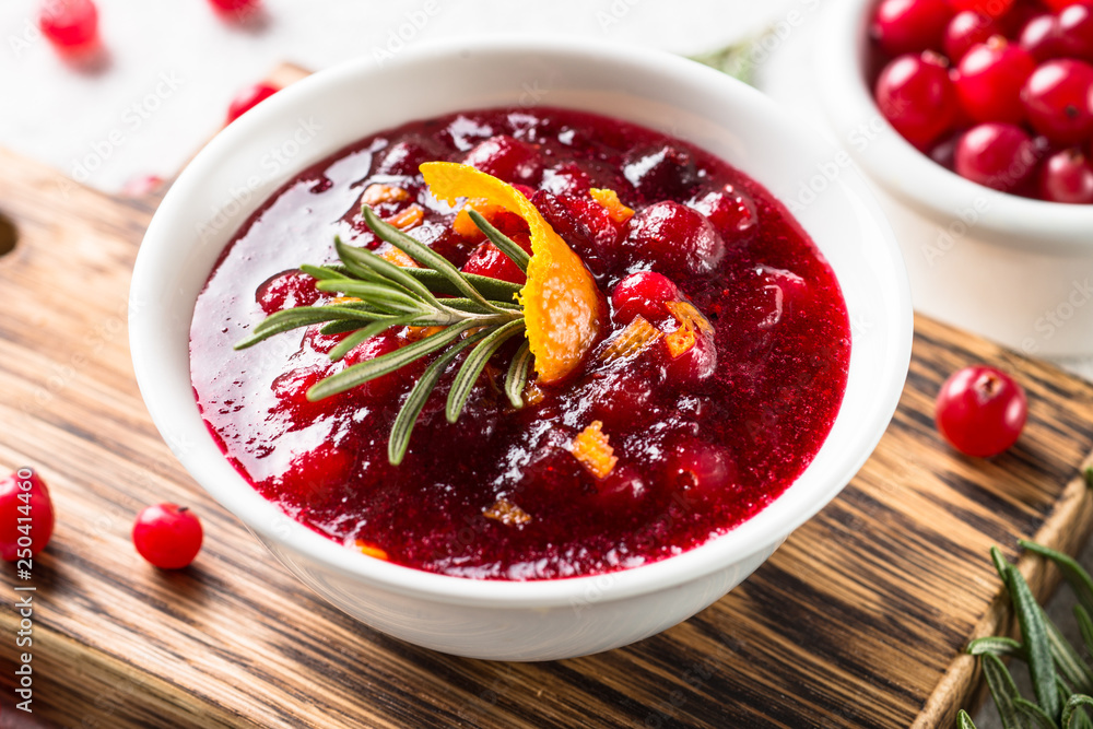 Cranberry sauce in a bowl top view. Cranberry sauce in a bowl top view.