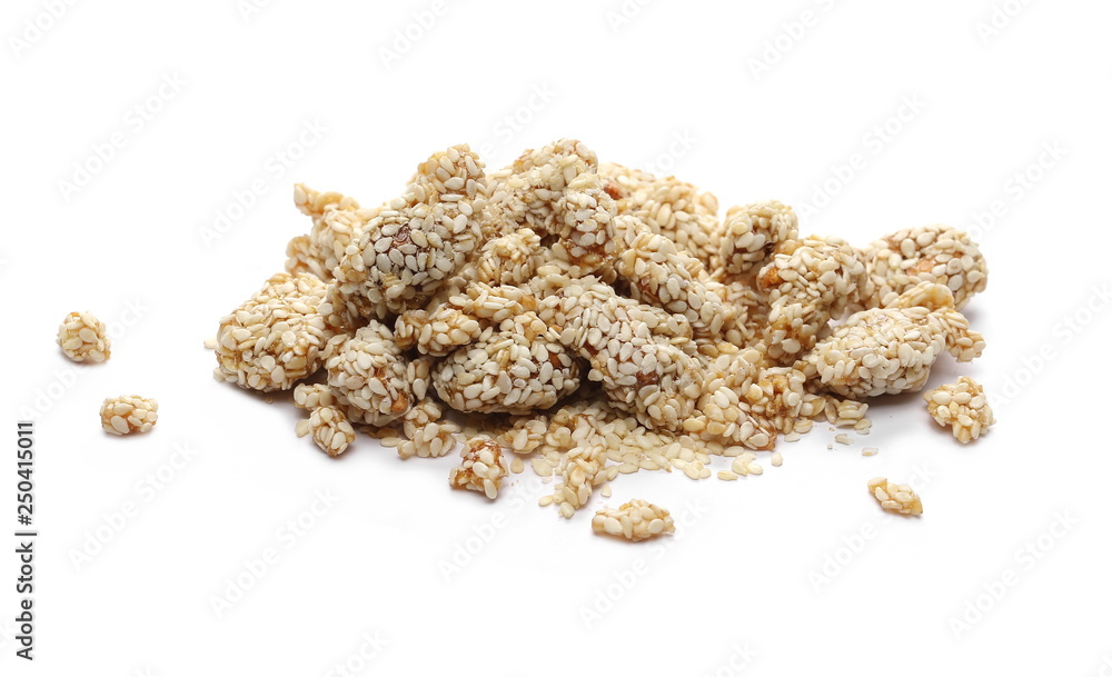 Peanuts coated in honey and sesame isolated on white background Peanuts coated in honey and sesame isolated on white background