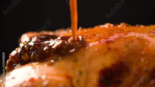 Pouring Fried Roasted Chicken with sauce Extremely closeup Macro shot Slow motion cooking video