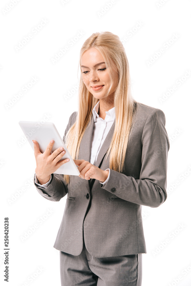 smiling businesswoman working on digital tablet isolated on white smiling businesswoman working on digital tablet isolated on white