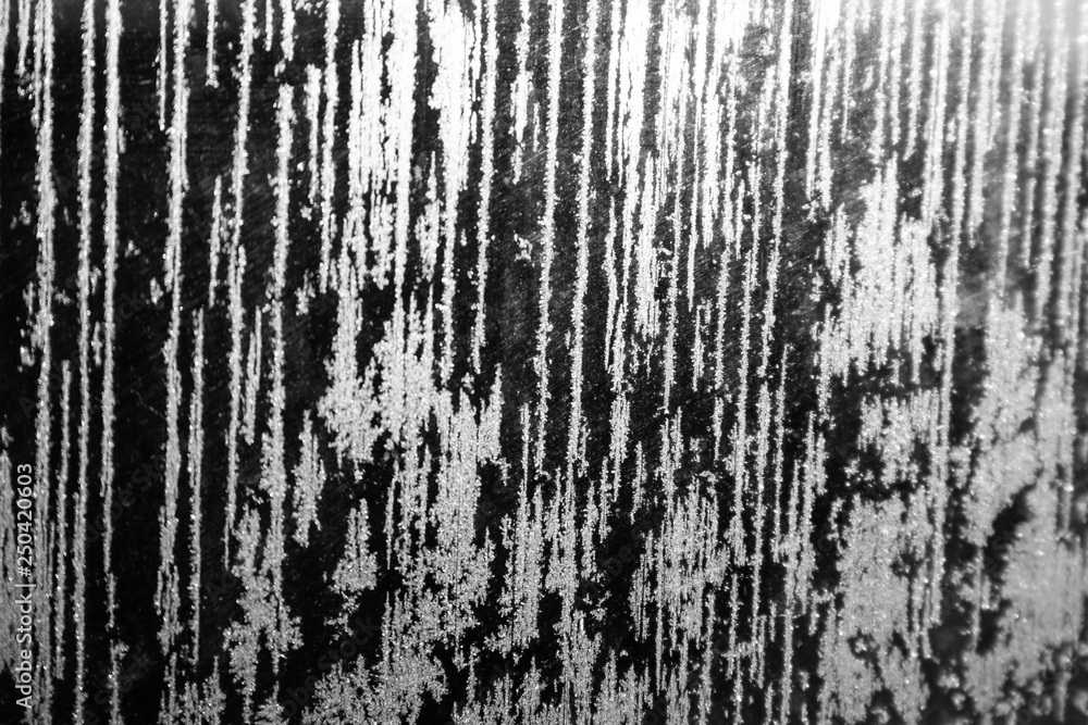 Fototapeta premium Black and white background frozen glass