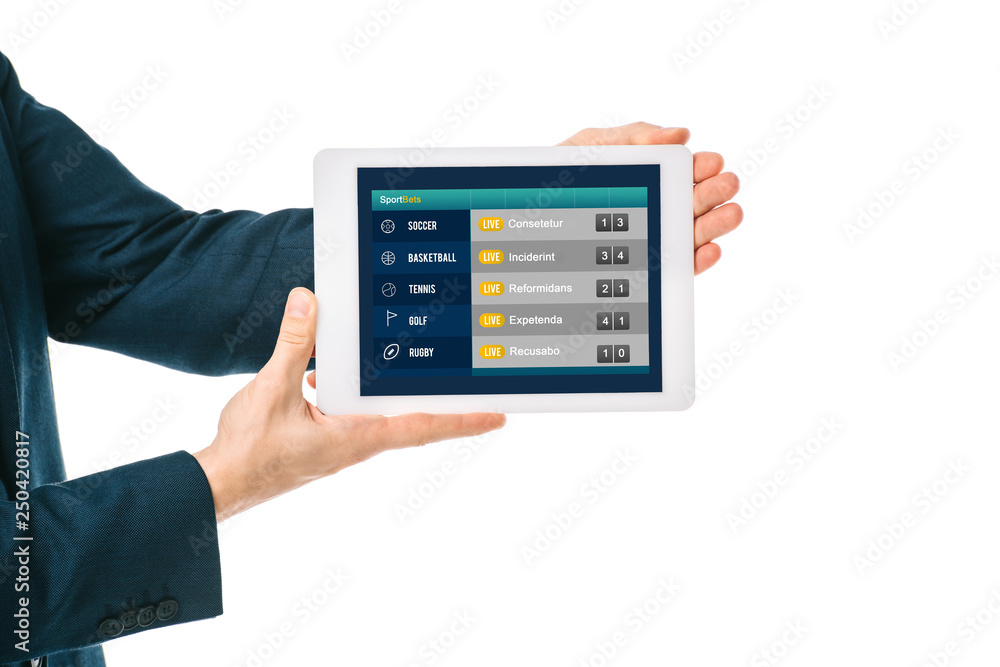 cropped view of businessman showing digital tablet with sports app, isolated on white cropped view of businessman showing digital tablet with sports app, isolated on white