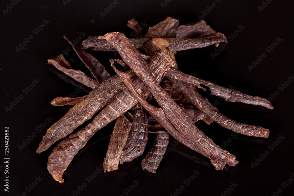 tasty, crispy, meat, smoked, crisp snack on a black background, for culinary design tasty, crispy, meat, smoked, crisp snack on a black background, for culinary design