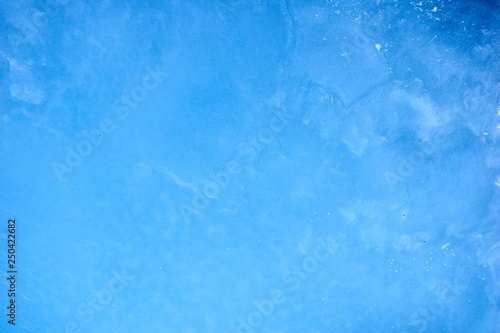 Texture blue cosmic ice with a matte effect on a lake