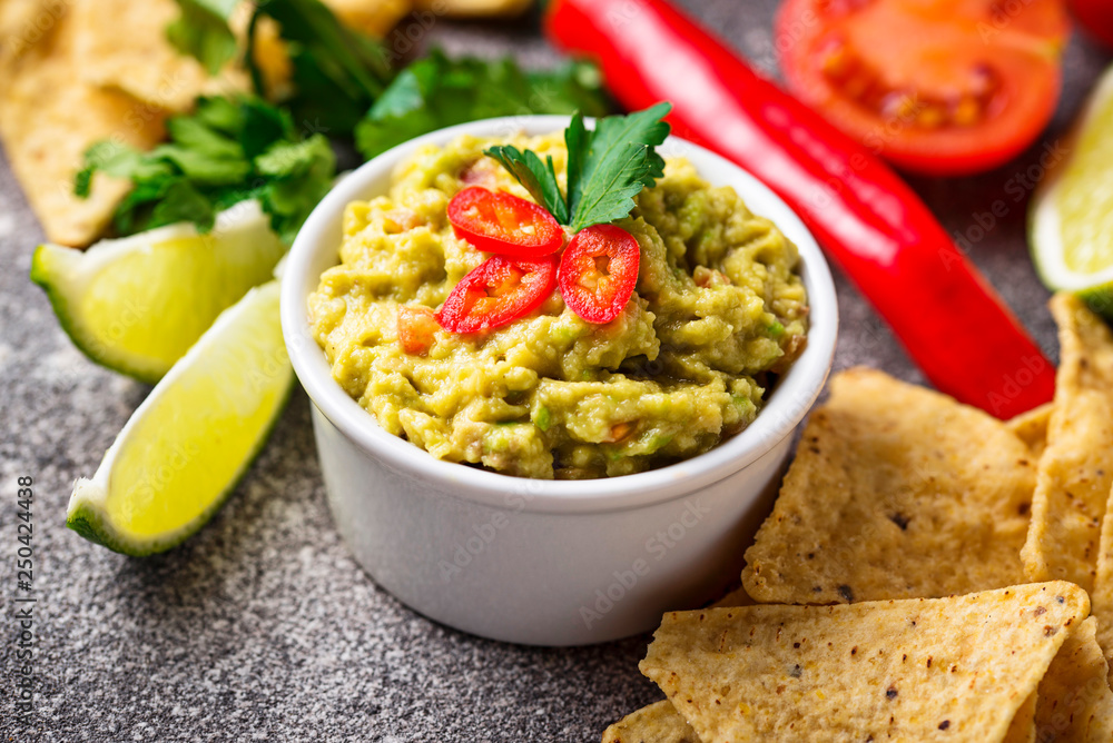 Avocado sauce guacamole with corn chips nachos Avocado sauce guacamole with corn chips nachos