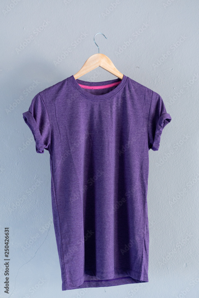 Retro fold purple cotton T-Shirt clothes mock up template on grunge ...