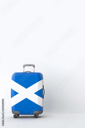 Travel suitcase with the flag of Scotland. Holiday destination. 3D Render