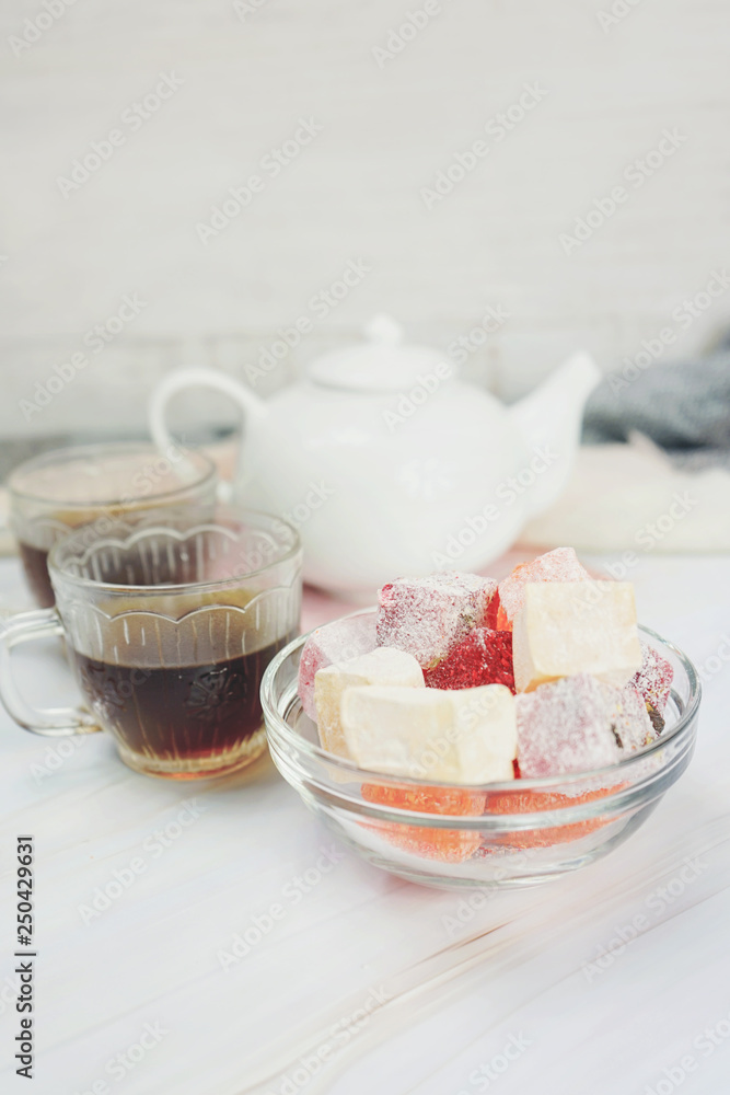 Delicious turkish delights with red tea Delicious turkish delights with red tea