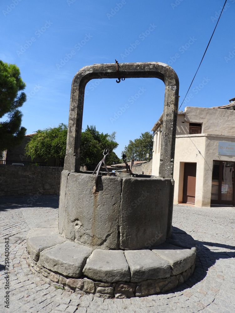 Stone well in the town of France.