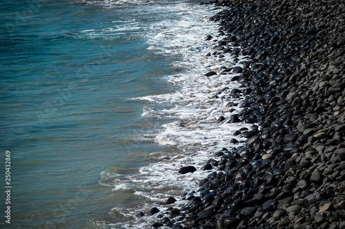 Beach of black volcanic roc...