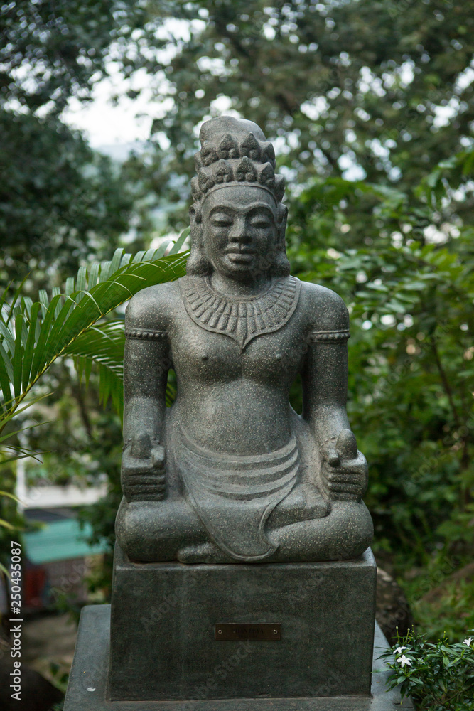 Nha Trang, Vietnam stone divine statues of ancient Vietnamese culture, located near the temple complex on Nagar in the city of Nha Trang.