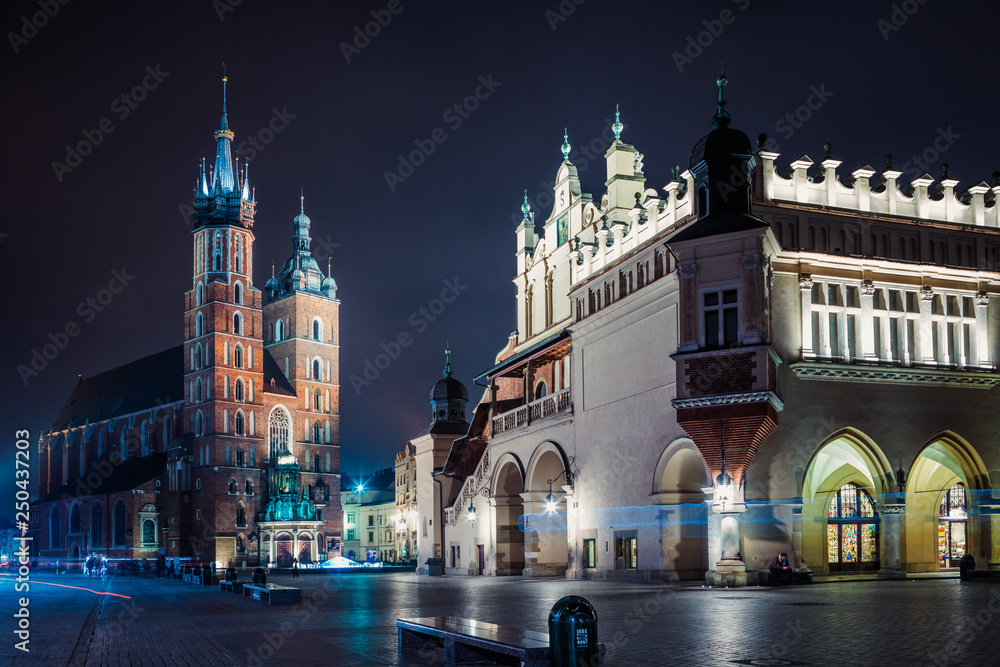 St. Mary's Basilica (Church of Our Lady Assumed into Heaven) and Cloth Hall in Krakow, Poland at night