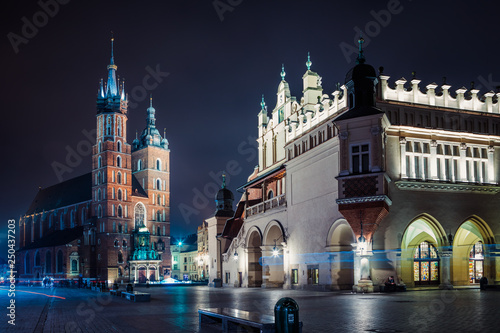 St. Mary s Basilica  Church of Our Lady Assumed into Heaven  and Cloth Hall in Krakow  Poland at night