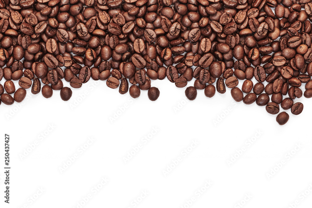 Naklejka premium Roasted coffee beans with space for text on white table background