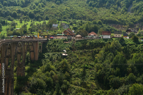 Durmitor, Montenegro - August 31, 2018: Old bridge in Durdevica over river Tara canyon