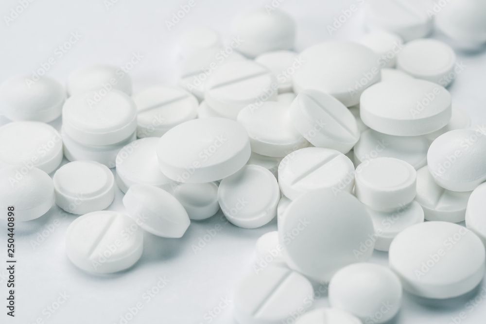 white pills and tablets capsule isolated on white background