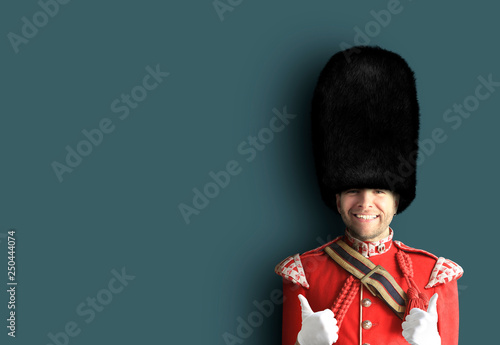 Photography Young man in the costume of the Royal guards of Britain