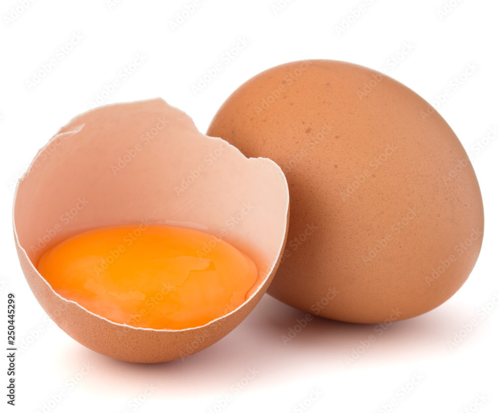 Broken egg in eggshell half and raw egg isolated on white background cutout Broken egg in eggshell half and raw egg isolated on white background cutout