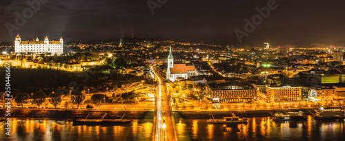 Beautiful panorama of Bratislava Downtown.View of night town.Cityscape at twilight.Traveling concept background.The landscape of the old historical city.Architecture, buildings Slovakia,Europe