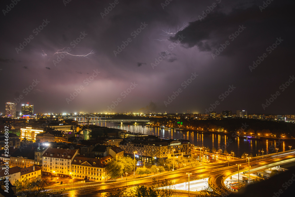 Beautiful panorama of Bratislava Downtown.View of night Thunderstorm .Cityscape at twilight.Traveling concept background.The landscape of the old historical city.Architecture,buildings Slovakia,Europe