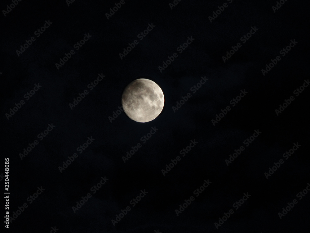 Obraz premium Moon, crescent, earth satellite against a dark background of black night sky.