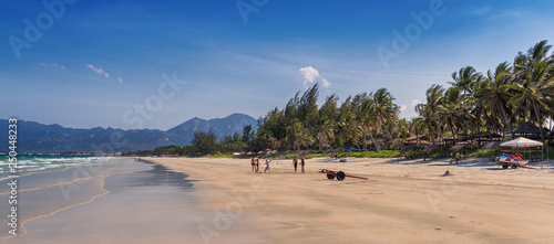 Vietnam. May 3, 2015: Men play football on the beach 