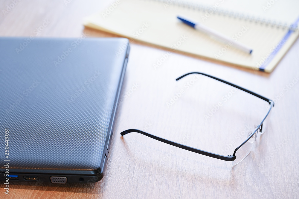 Tablet computer red case stand for tablet a great accessory. A detailed notebook and glasses. For work. Tablet computer red case stand for tablet a great accessory. A detailed notebook and glasses. For work.