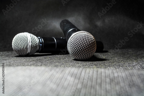 Kiev, Ukraine. January 10, 2019. The microphone for singing on black background lies. Karaoke. Modern technologies. Music. Gadgets