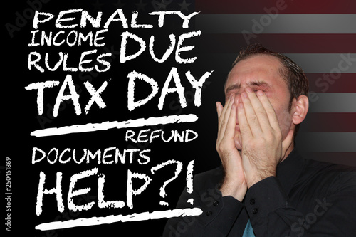 businessman stressed face expresion, having troble with tax form photo