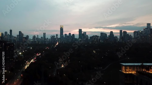 Unrecognizable City skyline at Dusk (Aerial, Drone Shot)